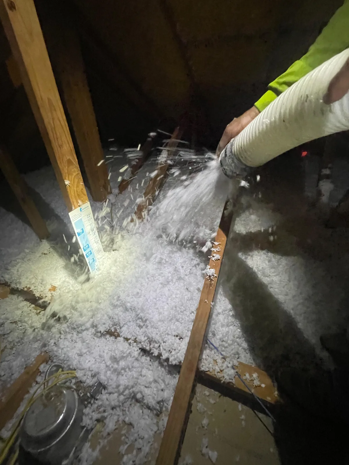 Attic insulation before an upgrade in a San Antonio area home